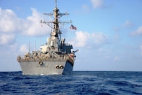The guided missile destroyer USS Ramage (DDG 61) steams in the Mediterranean Sea following a recoverable torpedo exercise April 10, 2014. The ship was on a scheduled deployment supporting maritime security operations and theater security cooperation efforts in the U.S. 6th Fleet area of responsibility. (U.S. Navy photo by Mass Communication Specialist 2nd Class Jared King/Released)