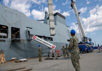 The Royal Danish and U.S. Navy conduct an on load of an inert SM-2 anti-aircraft missile aboard the Royal Danish Navy Iver Huitfeldt-class frigate HDMS Peter Willemoes (F362), June 10, 2023.