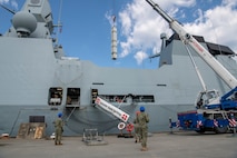 The Royal Danish and U.S. Navy conduct an on load of an inert SM-2 anti-aircraft missile aboard the Royal Danish Navy Iver Huitfeldt-class frigate HDMS Peter Willemoes (F362), June 10, 2023.