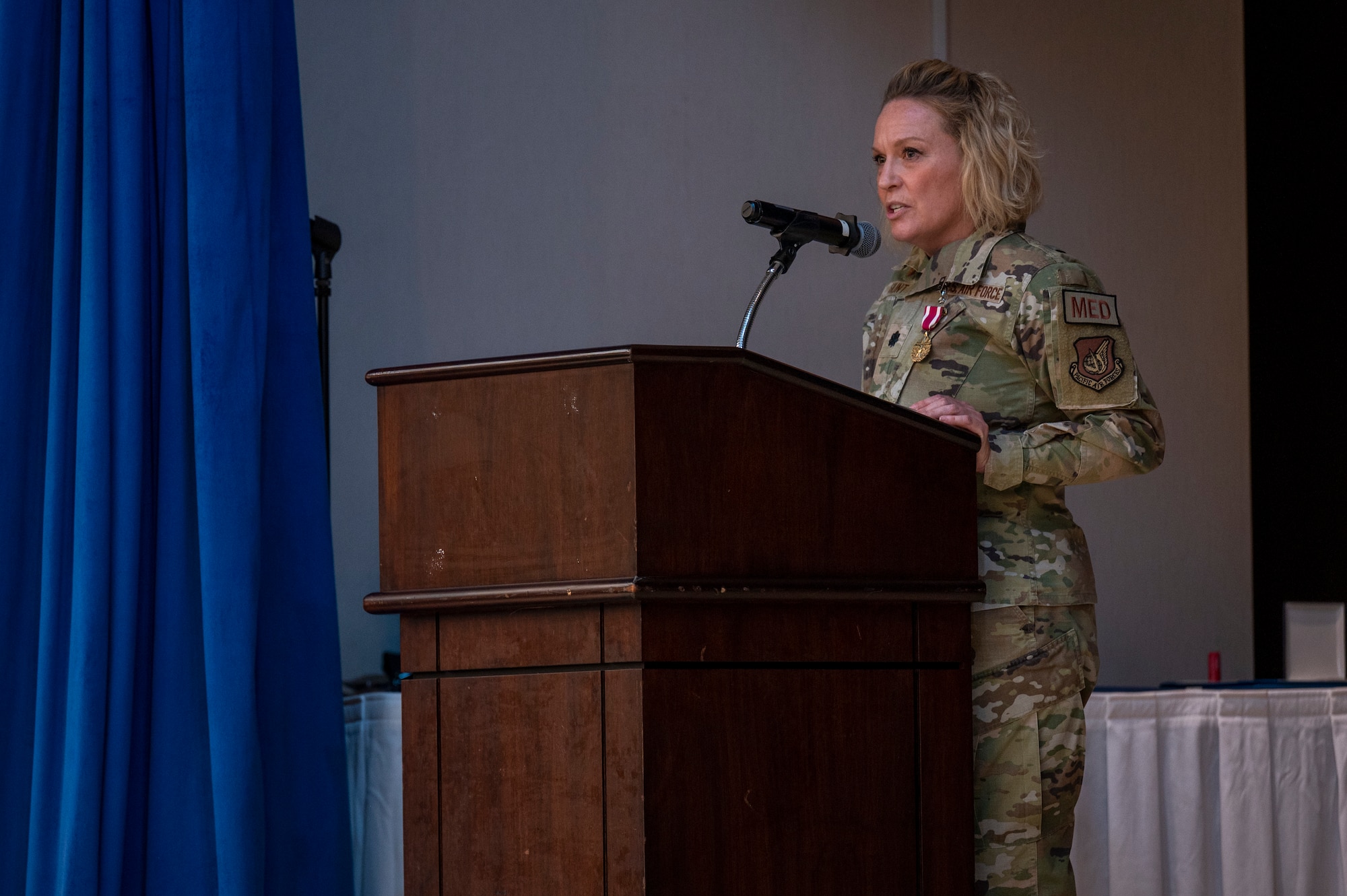 U.S. Air Force Lt. Col. Shannon Hunt, 51st Operational Medical Readiness Squadron outgoing commander, provides a speech during the 51st OMRS change of command at Osan Air Base, Republic of Korea, June 8, 2023. During the ceremony, Lt. Col. Jamie Cornett took command of the 51st OMRS. (U.S. Air Force photo by Airman 1st Class Aaron Edwards)