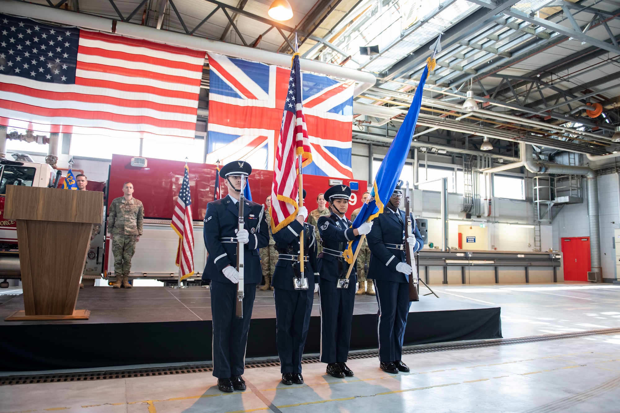 Members of the 501st Combat Support Wing honor guard present the colors at RAF Alconbury