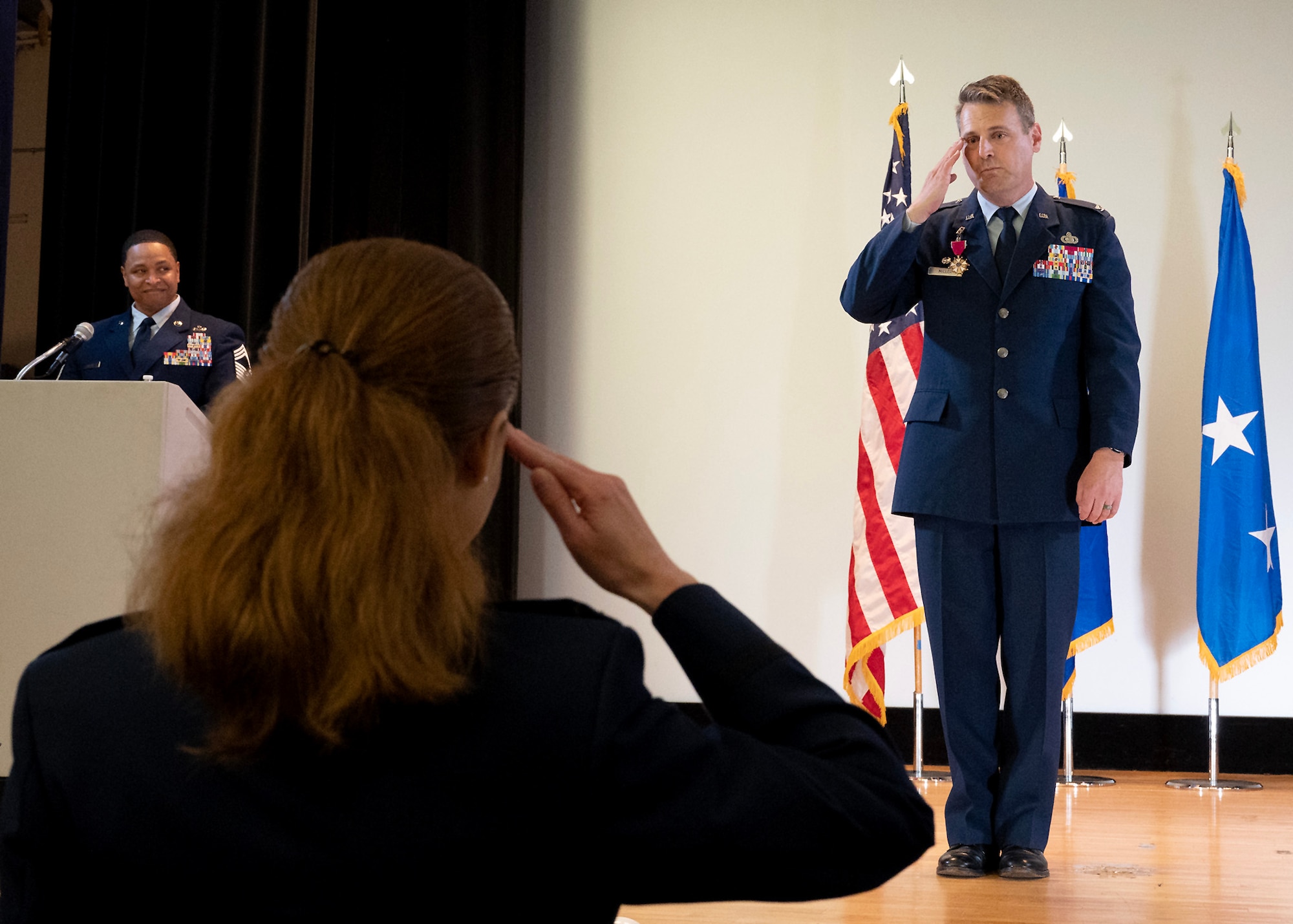 U.S. Air Force Col. Craig S. Miller, 70th Intelligence, Surveillance, and Reconnaissance Wing commander, renders a final salute during the 70th ISRW Change of Command Ceremony June 9, 2023, at Fort George G. Meade, Maryland. U.S. Air Force Lt. Gen. Kevin B. Kennedy, 16th Air Force (Air Forces Cyber) commander, presided over the ceremony, which Miller relinquished command of the 70th ISRW to U.S. Air Force Col. Celina E. Noyes. (U.S. photo by Staff Sgt. Kevin Iinuma)