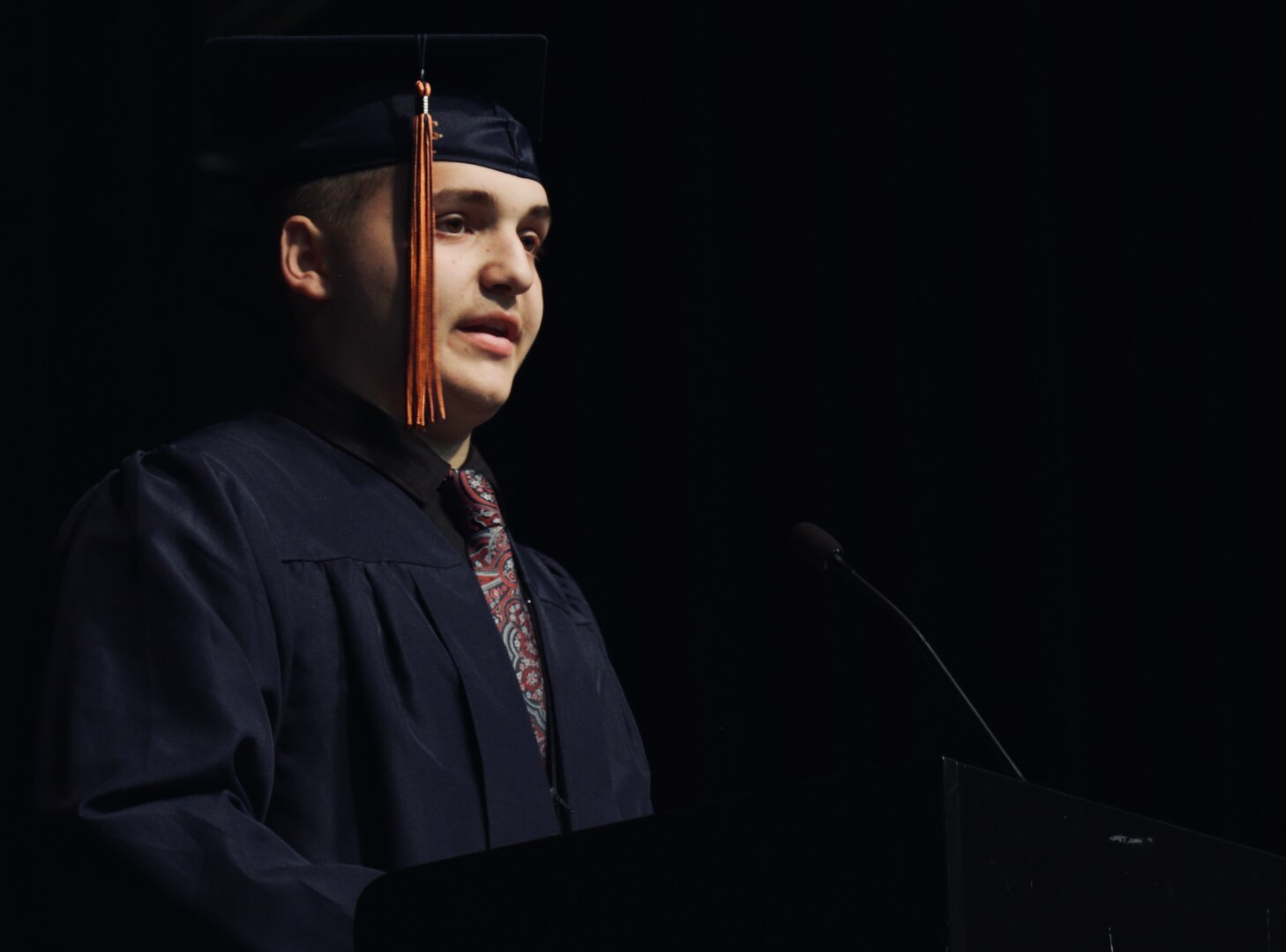 Lincoln's ChalleNGe Academy graduate Nickolas McCauley delivers the class summary during graduation ceremonies June 10, 2023, in Springfield, Ill. The Illinois National Guard program  July 1993 on the former Chanute Air Force Base in Rantoul, has helped 16,000 struggling young men and women find a path to success.