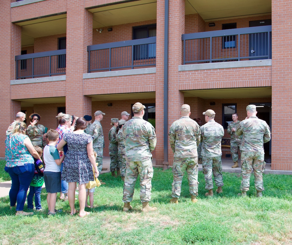 Members of the Dorm Council pose during the opening of the new day room June 2, 2023, at Sheppard Air Force Base, Texas. The Sheppard Spouses Club donated $1,800 to support the new day room for permanent party service members. (U.S. Air Force photo by Airman 1st Class Katie McKee)