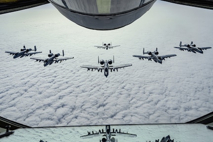 U.S. Air Force A-10 Thunderbolt II aircraft assigned to the 127th Wing, Michigan National Guard, fly in formation behind a KC-135 Stratotanker assigned to the 128th Air Refueling Wing, Wisconsin National Guard, June 5, 2023. Exercise Air Defender integrates U.S. and allied air-power to defend shared values, while leveraging and strengthening vital partnerships to deter aggression around the world.