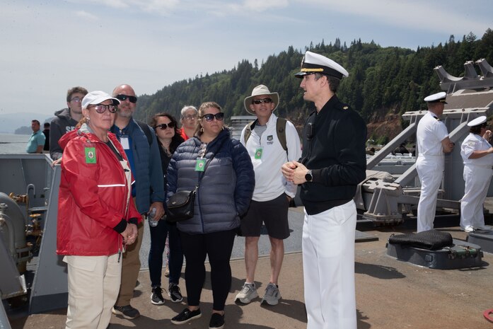 Lt. Cmdr Tyler Nichols gives a tour to embarked guests on the Arleigh Burke-class guided-missile destroyer, USS John S. McCain (DDG 56), to Portland, Oregon for the annual Rose Festival during Portland Fleet Week on June 8, 2023. Portland Fleet Week is a time-honored celebration of the sea services and provides an opportunity for the citizens of Oregon to meet Sailors, Marines and Coast Guardsmen, as well as witness firsthand the latest capabilities of today’s maritime services.