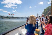 A U.S. Coast Guard MH-60 Jayhawk performs a search and rescue demonstration for a reception hosted by the U.S. Coast Guard Cutter Elm (WLB 204) during Portland Fleet Week on June 10, 2023. Portland Fleet Week is a time-honored celebration of the sea services and provides an opportunity for the citizens of Oregon to meet Sailors, Marines and Coast Guardsmen, as well as witness firsthand the latest capabilities of today’s maritime services. (U.S. Navy photo by Mass Communication Specialist 2nd Class Gwendelyn L. Ohrazda)