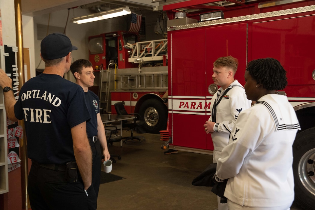 Portland Fire Department Station 3 gives a tour to to Hospital Corpsman Second Class Kevin German and Hospital Corpsman Third Class Kinyua Anastasia assigned to the Arleigh Burke-class guided-missile destroyer, USS John S. McCain (DDG 56), in Portland, Oregon for the annual Rose Festival during Portland Fleet Week on June 10, 2023. Portland Fleet Week is a time-honored celebration of the sea services and provides an opportunity for the citizens of Oregon to meet Sailors, Marines and Coast Guardsmen, as well as witness firsthand the latest capabilities of today’s maritime services.
