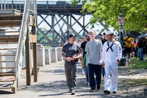 Local citizens attend U.S. Navy ship tours during Portland Fleet Week in Portland, Oregon, June 10, 2023.  Portland Fleet Week is a time-honored celebration of the sea services and provides an opportunity for the citizens of Oregon to meet Sailors, Marines and Coast Guardsmen, as well as witness firsthand the latest capabilities of today's maritime services. (U.S. Navy photo by Mass Communication Specialist Seaman Sophia H. Bumps)