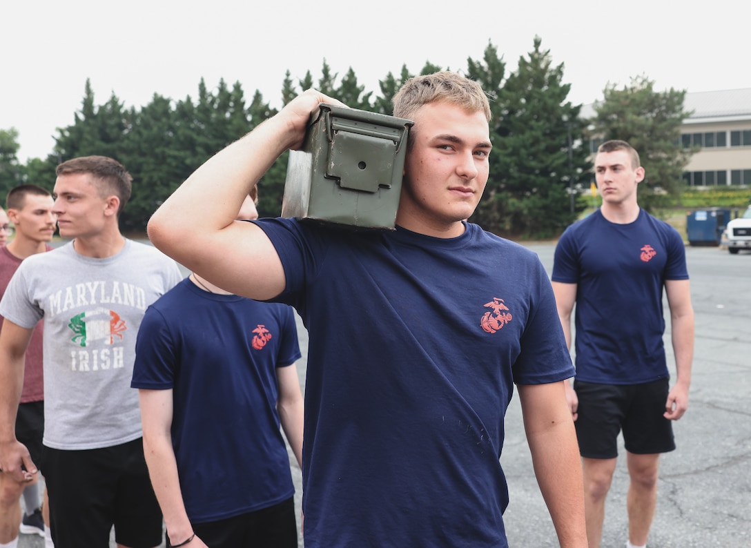 Christian Casteel, a poolee in the Delayed Entry Program (DEP) at Recruiting Substation (RSS) Frederick, prepares for a formation run during a physical training session at RSS Frederick, Frederick, Maryland, June 8, 2023. The purpose of the DEP is to prepare poolees for the physical and mental rigors of Marine Corps recruit training. (U.S. Marine Corps photo by Cpl. Bernadette Pacheco)