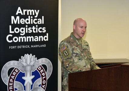 Capt. Matthew Lile speaks during a U.S. Army Medical Logistics Command Headquarters and Headquarters Detachment change of command ceremony June 9 at Fort Detrick, Maryland. Through the passing of the unit colors, Lile assumed detachment command from Maj. Matthew Smith during the ceremony. (U.S. Army photo by C.J. Lovelace)