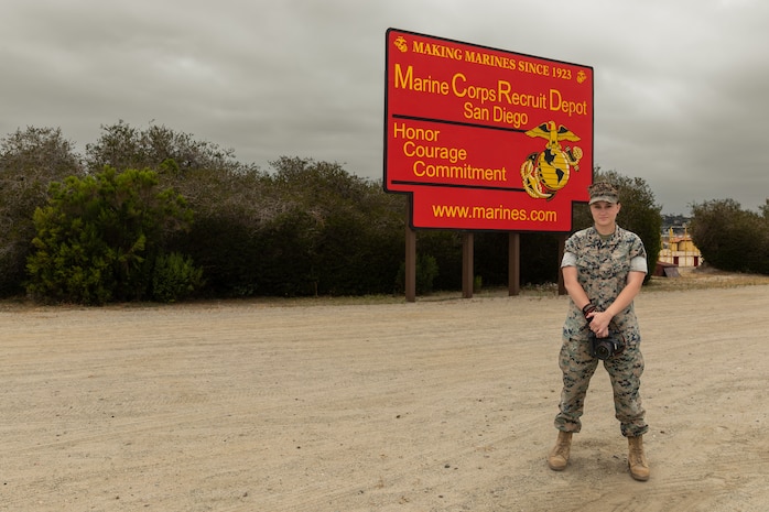 U.S Marine Corps Cpl. Grace J. Kindred, a Combat Photographer with Communication Strategy and Operations, Marine Corps Recruit Depot (MCRD) San Diego and the Western Recruiting Region poses near the 60-foot rappel tower aboard MCRD San Diego, May 24, 2023. Corporal Kindred arrived at MCRD San Diego on Feb. 22, 2019, as a Combat Photographer, 4531 Military Occupation Specialties. Corporal Kindred has spent the past four years capturing the transformation of Marine Recruits into U.S. Marines. Her photographs of Recruits/Marines have been used throughout the nation and have influenced future Marines and the Marine Corps story. A truly exciting time as Corporal Kindred completes her honorable service at the end of June and leaves the Marine Corps to start her new adventures in her home state of Hondo, Texas. Armed with Marine Corps ethos she will be able to call on the strengths she has gained while serving our Nation to continue serving others.

"I'm incredibly fortunate that God has blessed me with the opportunity to work with such great men and women on the depot. I'm grateful for my time in the Marine Corps and everything serving has afforded me, said Kindred." (U.S. Marine Corps photo by Jesse Lora)

Do you have what it takes to be a Marine?

What to know more about becoming a Combat Videographer, Combat Graphics
Specialist, or a Combat Photographer?

Call your local Marine Recruiter.

WE DO NOT JOIN THE MARINES. WE BECOME MARINES.