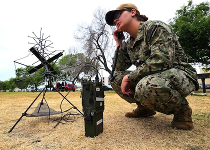 lectronics Technician 3rd Class Abbigail Little, assigned to Explosive Ordnance Disposal Expeditionary Support Unit (EODESU) 1, uses a PRC-117G radio during an Explosive Ordnance Disposal Group (EODGRU) 1 communications exercise at Naval Amphibious Base Coronado, California, May 23, 2023.