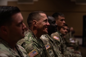 U.S. Army noncommissioned officers assigned to the 1st Infantry Division listen to Sgt. Maj. of the Army Michael A. Grinston during a leadership professional development engagement on Fort Riley, Kansas, June 6, 2023. Grinston engaged with NCOs in open discussion and talked about lessons he learned during his 36 years of service in the U.S. Army. (U.S. photo by Spc. Charles Leitner)