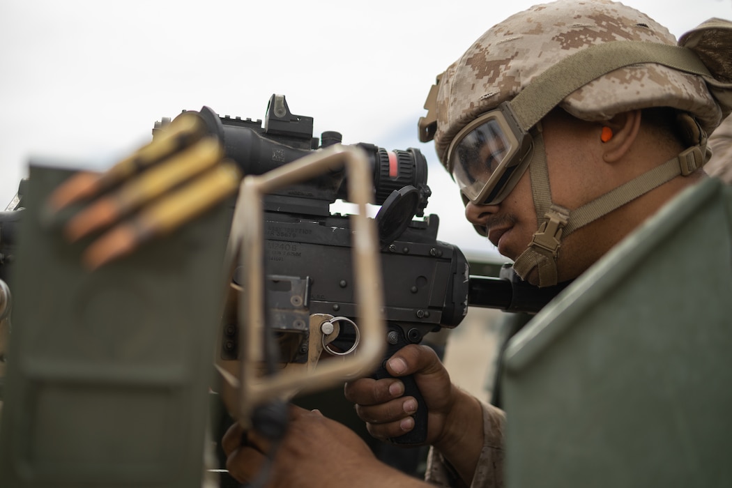 Marines with Truck Company, 23D Marine Regiment, 4th Marine Division, shoot M240B weapon systems on range 113