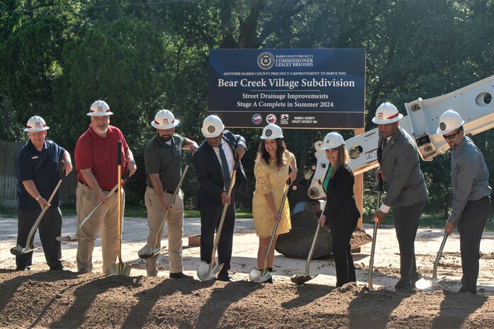 U.S. Army Corps of Engineers, Galveston District representatives, including Byron Williams, Deputy District Engineer, second from right, David Mackintosh, Chief - Houston Project Office, right, and community partners break ground at the groundbreaking ceremony for a Harris County-led drainage improvement project in Bear Creek Village, Houston TX, June 9, 2023.