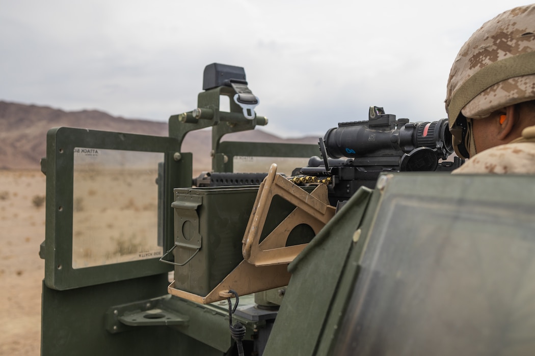 Marines with Truck Company, 23D Marine Regiment, 4th Marine Division, shoot M240B weapon systems on range 113