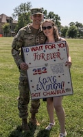 U.S. Army Soldier assigned to the 97 Military Police Battalion, 89th Military Police Brigade, 1st Infantry Division, returns from deployment on Fort Riley, Kansas, June 7, 2023. The Soldier returned home to his family from an over 8 month deployment to Poland. (U.S. Army photo by Pvt. Autumn Johnson)