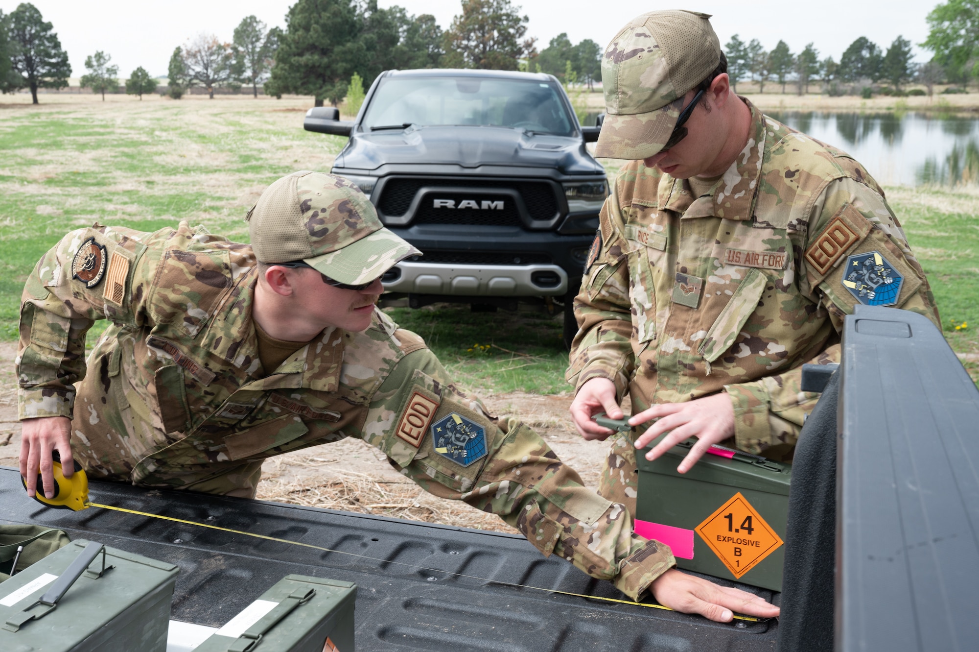 PETERSON SPACE FORCE BASE, Colo. – U.S. Air Force Senior Airmen Reese Collins, and Explosive Ordnance Disposal apprentice, and Jacob Rice, an EOD team member, both part of the 21st CES EOD, measure detonating cords as part of a training on Peterson Space Force Base, Colorado, May 25, 2023. Collins and Rice cut multiple cords and measured each one to ensure they were the same length to detonate simultaneously. (U.S. Space Force photo by Airman 1st Class Justin Todd)