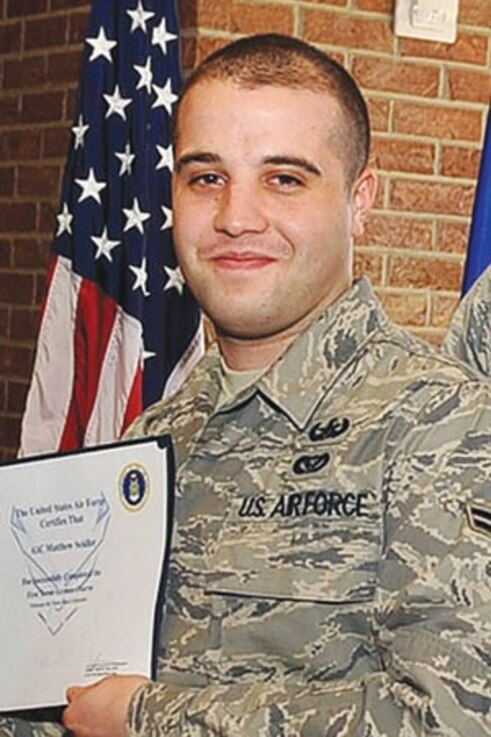 U.S. Air Force Airman 1st Class Matthew Seidler, an Explosive Ordnance Device technician from the 21st Civil Engineer Squadron, receives an official Air Force certificate. Seidler was killed at age 24 when an improvised explosive device hit his vehicle in Afghanistan on Jan. 5, 2012. (Courtesy photo)