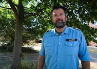 PUTLOS, Germany (June 11, 2023) German Navy Cmdr. Philipp Klimmek poses for a photograph near the NATO Commander Task Group 162.40 command staff area at the Bundeswehr military training area in Putlos, Germany, during exercise Baltic Operations 2023 (BALTOPS 23). BALTOPS 23 is the premier maritime-focused exercise in the Baltic Region. The exercise, led by U.S. Naval Forces Europe-Africa, and executed by Naval Striking and Support Forces NATO, provides a unique training opportunity to strengthen combined response capabilities critical to preserving freedom of navigation and security in the Baltic Sea. (U.S Navy photo by Mass Communication Specialist 1st Class Matthew Fink)