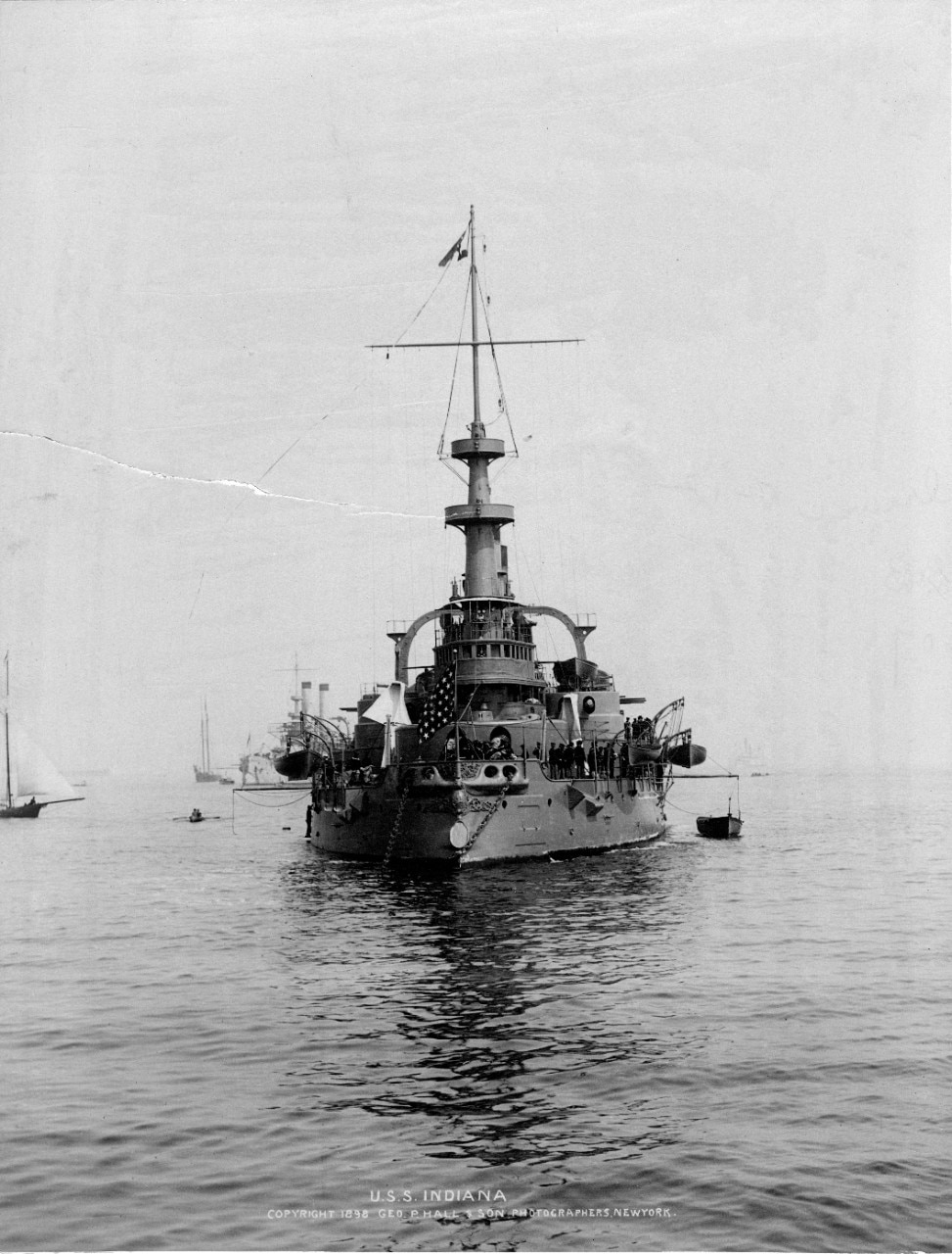 USS Indiana (BB-!) Photographed off New York City by George P. Hall & Sons, Summer 1898. USS Iowa (BB-4) is in the distance, beyond Indiana's starboard side. U.S. Naval History and Heritage Command Photograph.