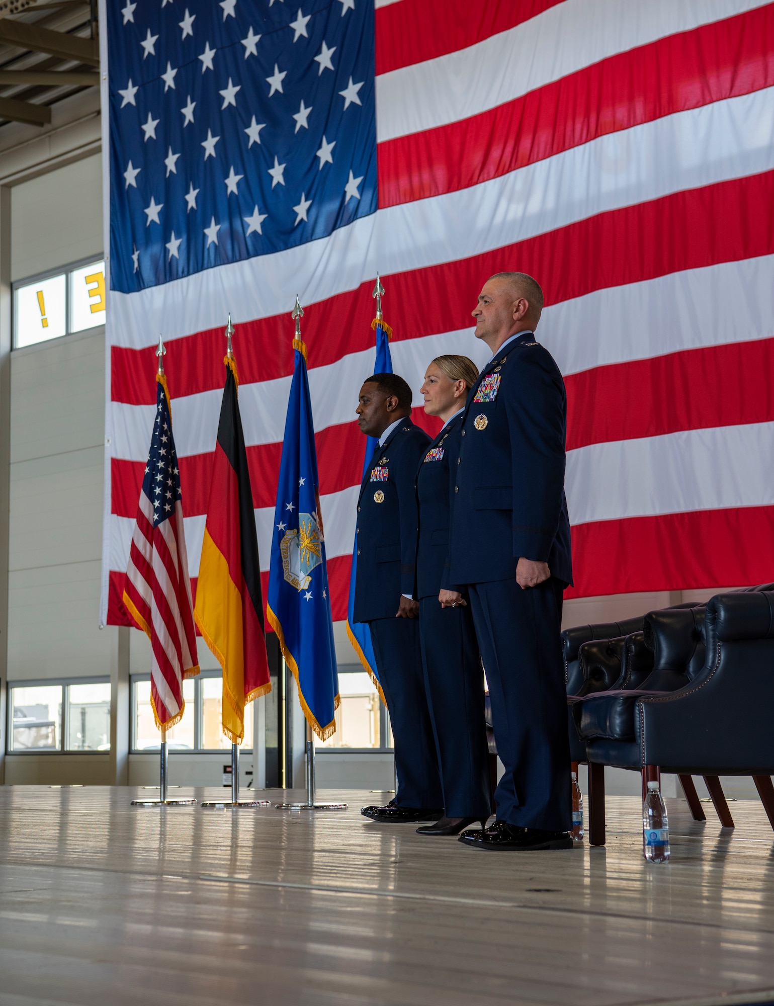 U.S. Air Force Brig. Gen. Otis C. Jones, left, 86th Airlift Wing commander, stands with Col. Amy M. Glisson, middle, outgoing 86th Mission Support Group commander, and Col. James A. Cunningham, right, incoming 86th MSG commander, at Ramstein Air Base, Germany, June 9, 2023