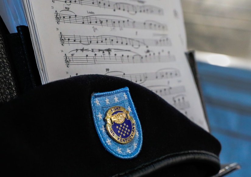 A beret sits over sheet music at the Kentucky State Capitol rotunda in Frankfort, Kentucky, on June 10th, 2023. Five Soldiers assigned to the Kentucky Army National Guard’s 202nd Army Band performed for the celebration of the 75th anniversary of the Women’s Armed Services Act. (U.S. Army photo by Spc. Danielle Sturgill)