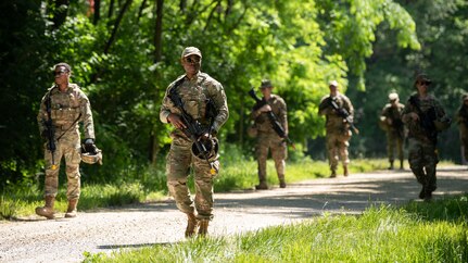 Airmen from the 181st Security Forces, Indiana Air National Guard, train in land navigation after offloading from a UH-60 Black Hawk helicopter in a remote location at Camp Atterbury Joint Maneuver Training Center, Ind., June 2, 2023. The Airmen used skills necessary for agile combat employment.