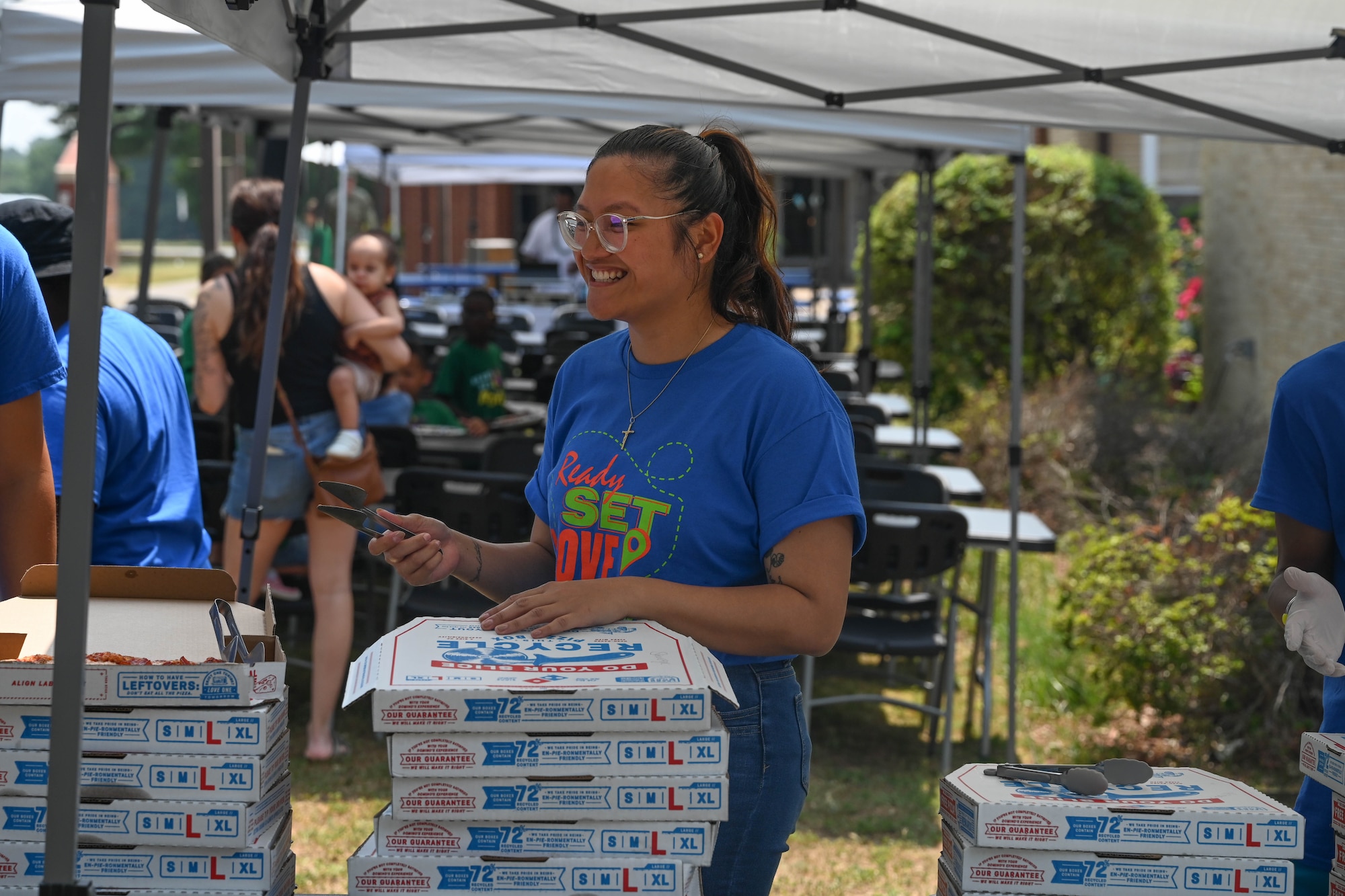 A woman volunteers during vacation bible school.
