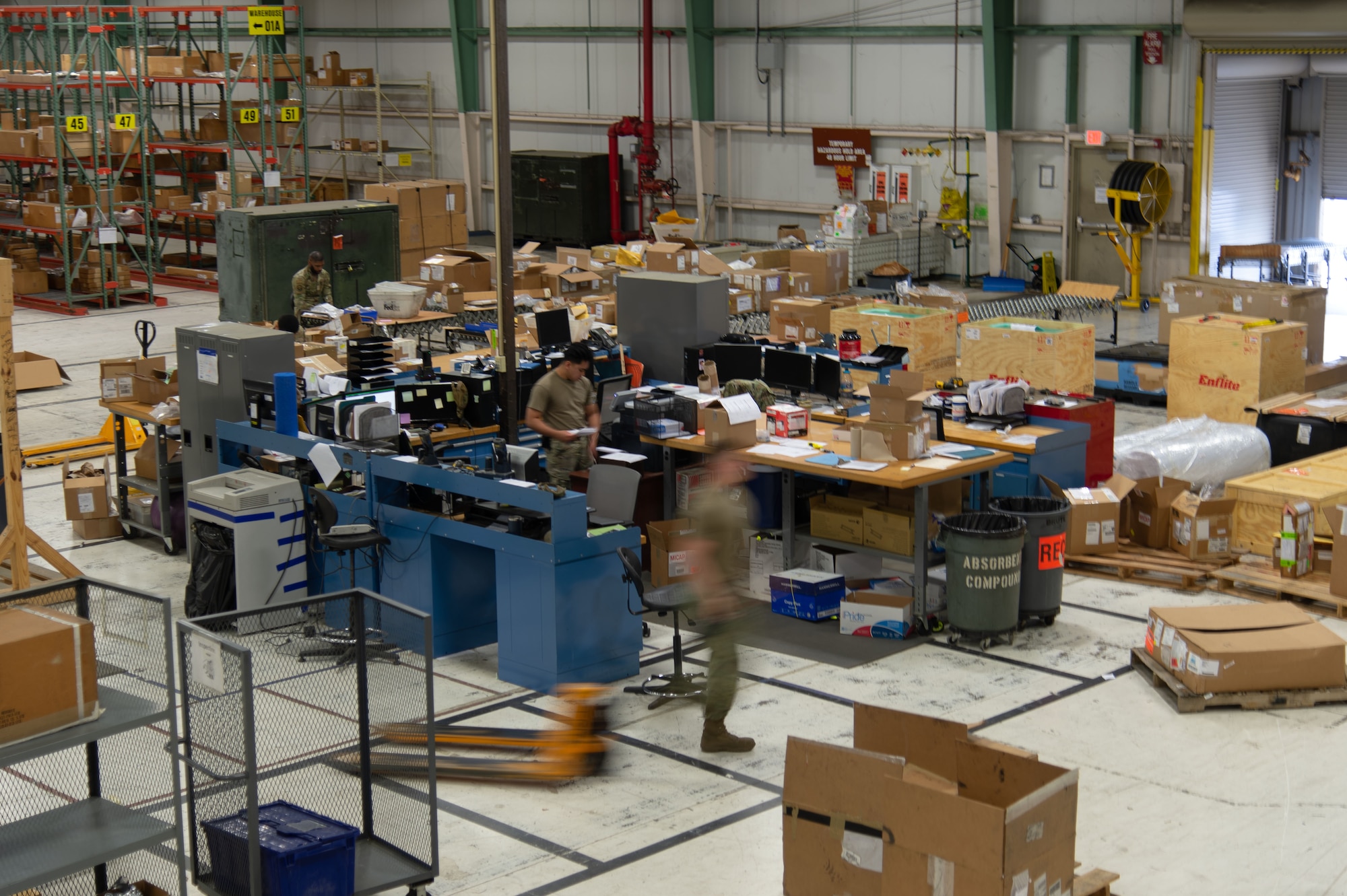 Inbound cargo specialists assigned to the 436th Aerial Port Squadron process incoming cargo at Dover Air Force Base, Delaware, May 9, 2023. The 436th APS Traffic Management Office (inbound) has been collocated within the 436th Logistics Readiness Squadron Supply building for more than two years, primarily handling and delivering aircraft parts. (U.S. Air Force photo by Roland Balik)