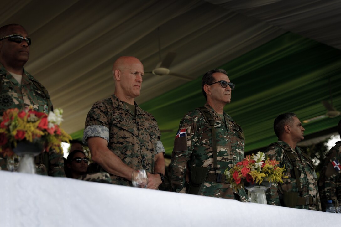 U.S. Marine Corps Brig. Gen. Peter Huntley, commander of Special Operations Command South, and Lt. Gen. Carlos Luciano Díaz Morfa, minister of defense of the Dominican Republic, stand during the opening ceremony for Fuerzas Comando 23.