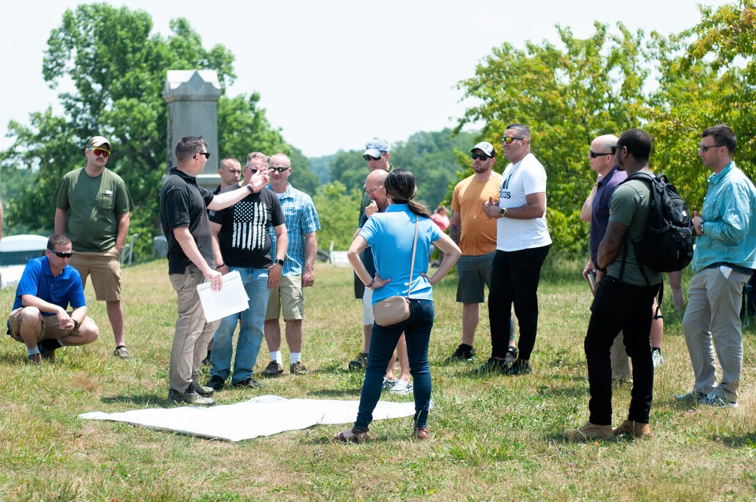 Sgt. 1st Class Aaron Heft, a historian with the U.S. Army Center of Military History, gives Soldiers with Headquarters and Headquarters Company, 166th Regiment Regional Training Institute facts and stories of the battlefield at Gettysburg National Military Park in Gettysburg, June 10, 2023. (U.S. Army National Guard photo by 1st Lt. Lindsey Boughter)