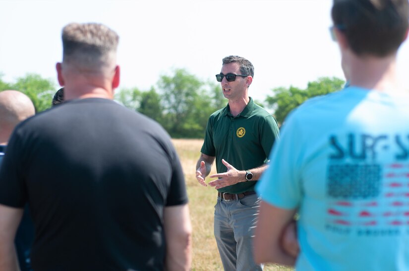 Jonathan Bratten, a historian with the Army Center of Military History, gives Soldiers with Headquarters and Headquarters Company, 166th Regiment Regional Training Institute facts and stories of the battlefield at Gettysburg National Military Park in Gettysburg, June 10, 2023. (U.S. Army National Guard photo by 1st Lt. Lindsey Boughter)