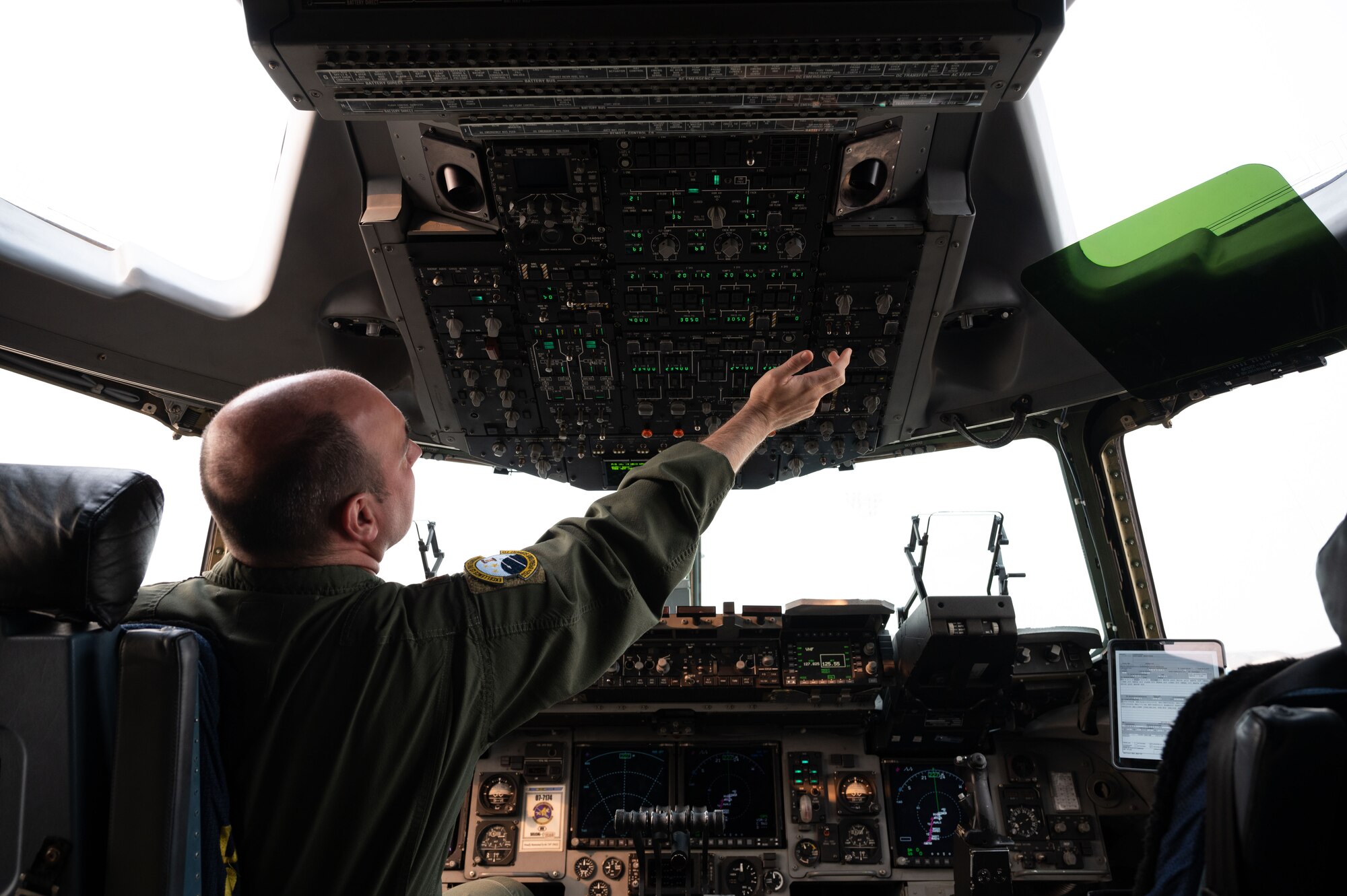 Maj. William Wilkerson, 326th Airlift Squadron instructor pilot, performs preflight checks on a C-17 Globemaster III during the 2023 hurricane evacuation exercise at Dover Air Force Base, Delaware, June 6, 2023. The C-17 was one of six Globemaster IIIs that departed Dover AFB during the hurricane evacuation exercise. (U.S. Air Force photo by Airman 1st Class Amanda Jett)