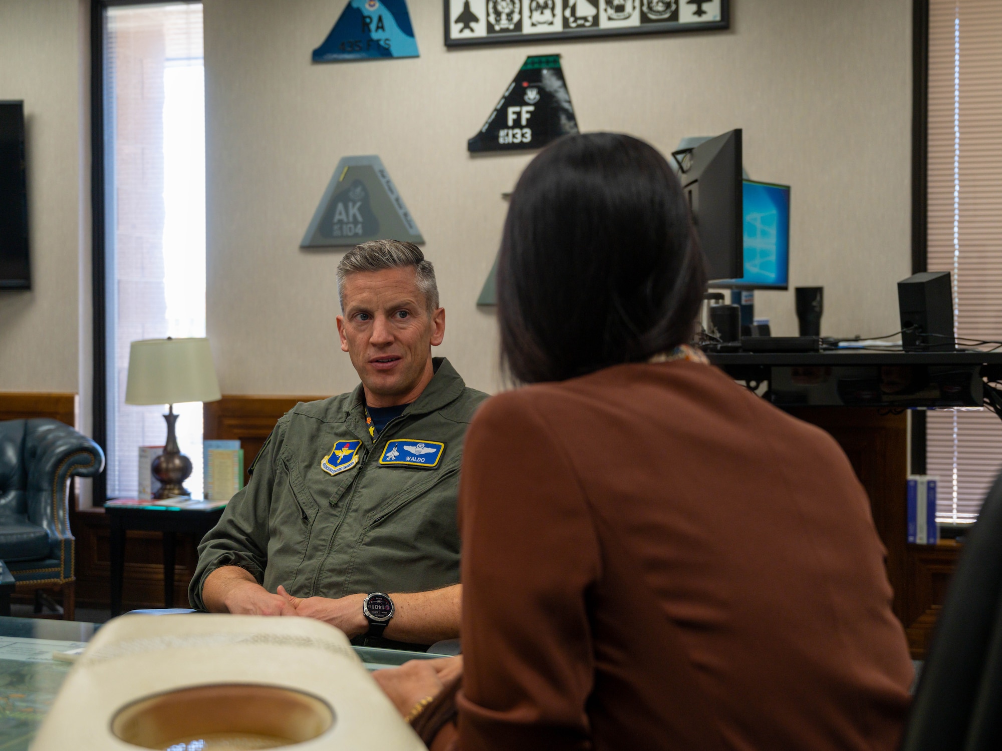U.S. Air Force Col. Keegan McLeese, (left) 56th Fighter Wing vice commander, speaks with Arizona state Sen. Janae Shamp, Arizona district 29 senator, June 9, 2023, at Luke Air Force Base, Arizona.