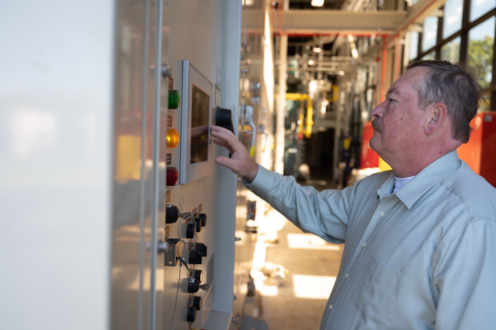 Man checks control panel