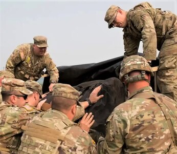 Soldiers from the 42nd Infantry Division conduct a command post movement commonly referred to as a jump June 9, 2023, during a Warfighter exercise at Fort Indiantown Gap, Pa. This movement allows Soldiers to practice their mobility skills to ensure that the command post can be moved rapidly from one location to another. (U.S. Army National Guard photo by Sgt. 1st Class Hurley Jelis)