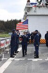 U.S. Coast Guard Capt. Timothy Brown, salutes the Coast Guard Cutter Bertholf's crew as the Coast Guard Cutter Bertholf's change of command ceremony begins in Kodiak, Alaska, June 12, 2023. A change of command ceremony marks a transfer of total responsibility and authority from one individual to another, and it is a time-honored tradition to formally demonstrate the continuity of authority within a command conducted before the assembled crew and esteemed guests and dignitaries. (U.S. Coast Guard photo by Chief Petty Officer Oliver Fernander)