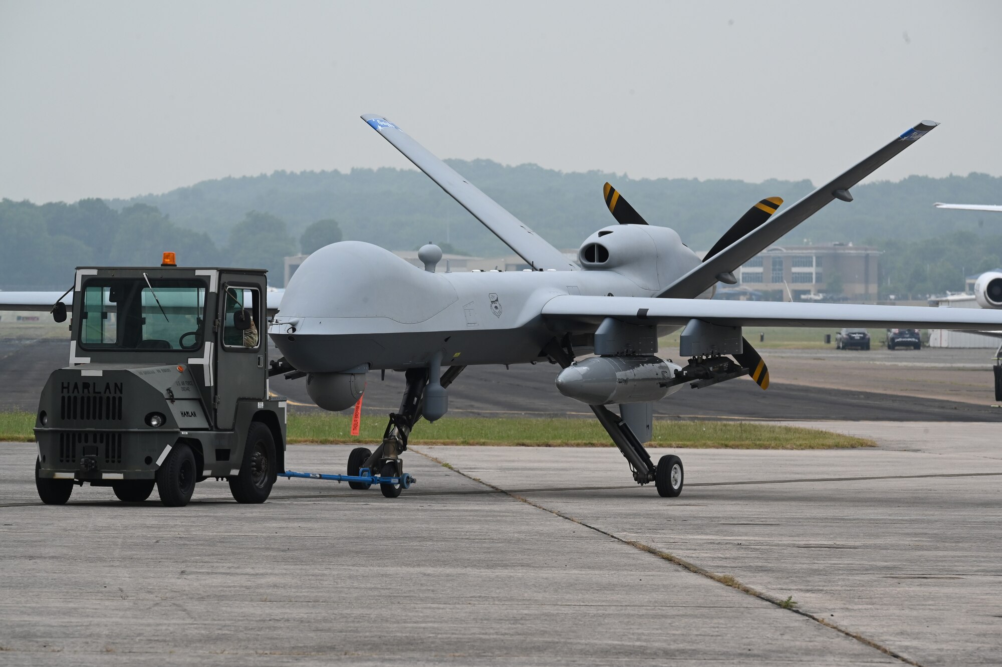 A MQ-9 Reaper lands in Tennessee for the first time in state history June 7, 2023 in Smyrna, Tennessee. The MQ-9, owned by the 163d Attack Wing of the California Air National Guard, is being flown by 118th Wing pilots of the Tennessee Air National Guard for the Whiskey Fury 2023 exercise June 12-16, 2023. (U.S. Air National Guard photo by Tech. Sgt. Anthony Agosti)