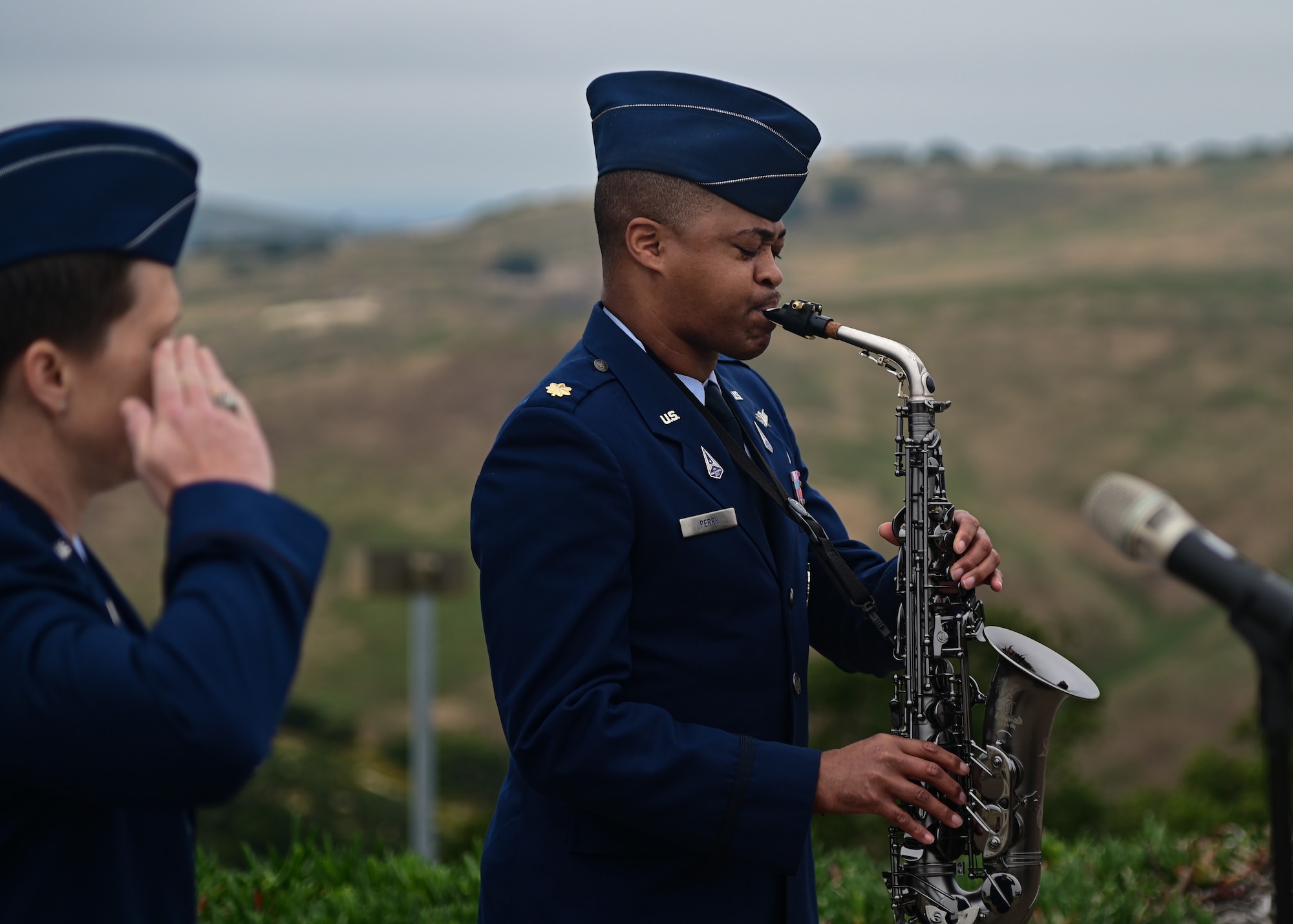 U.S. Space Force Maj. Derick Perry, 21st Space Operations Squadron CJ8 division chief, plays the National Anthem on his saxophone during a change of command ceremony on Vandenberg Space Force Base, Calif., June 9, 2023. U.S. Space Force Lt. Col. Matthew Knepper assumed command of the 21st SOPS, taking the place of Lt. Col. Justin Roque. (U.S. Space Force Photo by Airman 1st Class Ryan Quijas)