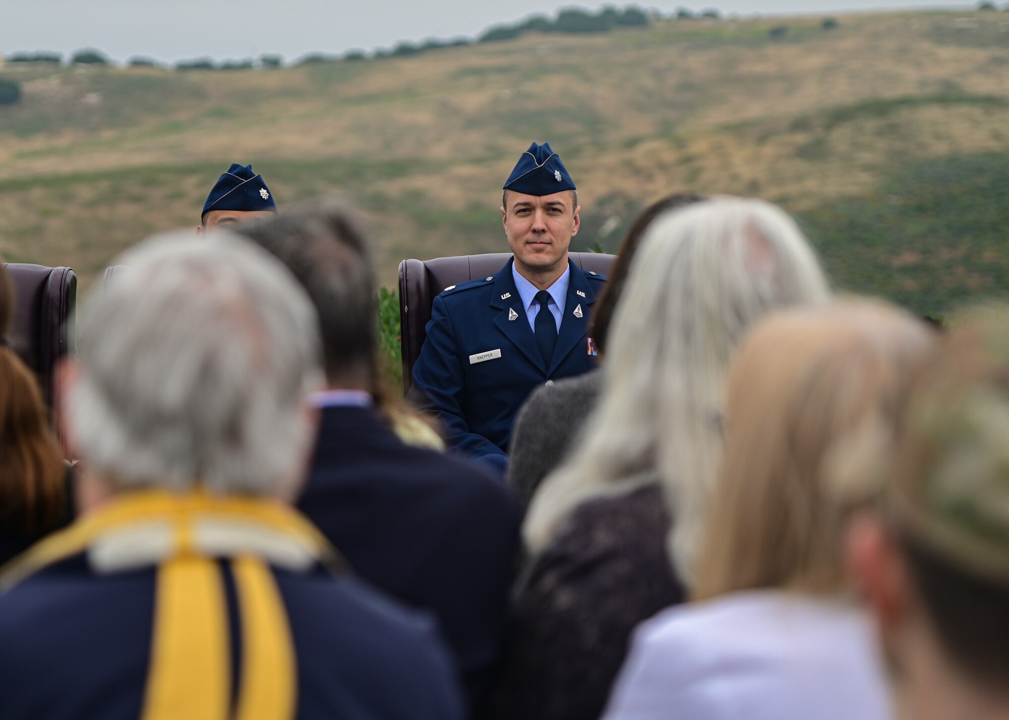 U.S. Space Force Lt. Col. Matthew Knepper, incoming 21st Space Operation Squadron commander, looks into the crowd during a change of command ceremony on Vandenberg Space Force Base, Calif., June 9, 2023. Knepper assumed command of the 21st SOPS, taking the place of Lt. Col. Justin Roque. (U.S. Space Force Photo by Airman 1st Class Ryan Quijas)