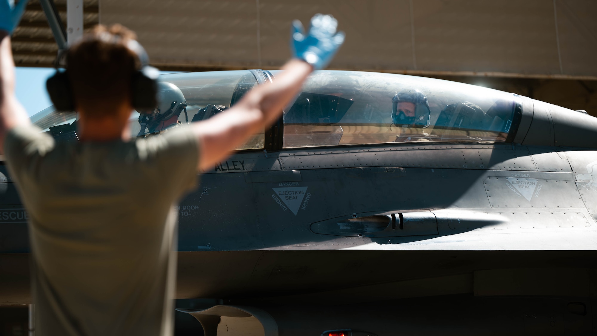 A U.S. Air Force F-16 Fighting Falcon taxis the runway of Luke Air Force Base