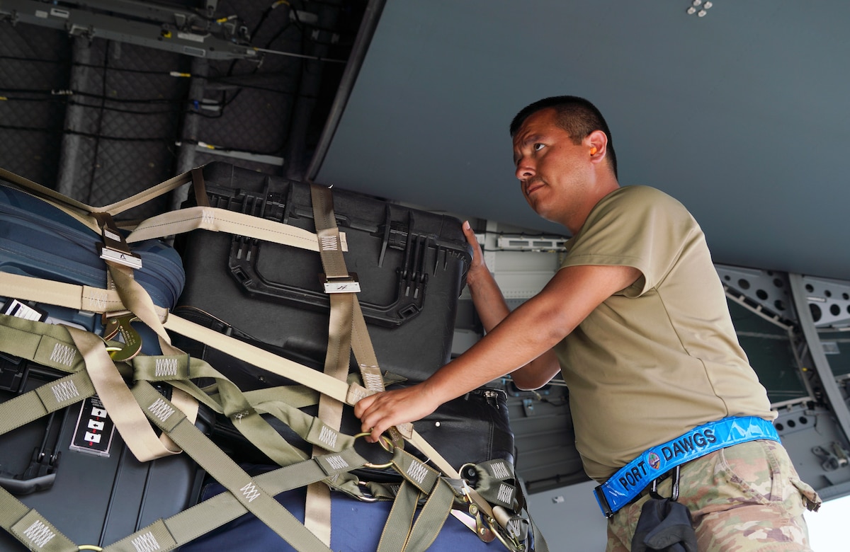 U.S. Air Force Staff Sgt. Jose Chavez, an aerial porter with the 146th Contingency Response Flight, 146th Airlift Wing, California National Guard, helps load a German air force A400M Atlas aircraft with U.S. Air Force personnel and cargo in preparation for exercise Air Defender 2023 at Wunstorf Air Base, Wunstorf, Germany, June 6, 2023. AD 23 integrates U.S. and allied air power to defend shared values while leveraging and strengthening vital partnerships to deter aggression worldwide.