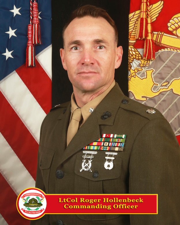 Lieutenant Colonel Hollenbeck was born in Denver, raised in Southern California and earned a Bachelor of Arts degree in Communication from the University of Colorado in June 2004. He was commissioned a Second Lieutenant in December 2005 and completed the Basic School and the Public Affairs Qualification Course in 2006.
Hollenbeck reported to II Marine Expeditionary Force, Camp Lejeune, N.C., and deployed to Iraq from January 2007, to February 2008. While deployed, he served as the media officer for Multi National Force-West, as aide de camp to the ground combat element commander, and was promoted to first lieutenant in December 2008.
In May 2008, Hollenbeck transferred to Camp Pendleton, Calif., where he served as the public affairs officer for the 11th Marine Expeditionary Unit. With the MEU, he completed the Winter Mountain Leaders Course, was promoted to captain January 2010, participated in extensive sea and land-based amphibious training exercises and deployed to the Western Pacific, Middle East and Horn of Africa regions twice.
In July 2012, Hollenbeck reported to Marine Corps Recruit Depot San Diego, where he served as a series commander, company executive officer and company commander in 2nd Recruit Training Battalion. He then served as Assistant Director of Drill Instructor School.Operations Officer and for both MARFORRES and MARFORNORTH.