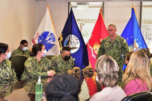 Naval Medical Forces Atlantic (NMFL) Command Master Chief Zachary Pryor discusses challenges with Sailors and civilians during an all hands call at the Adm. Joel T. Boone Branch Health Clinic onboard Joint Expeditionary Base Little Creek-Fort Story.