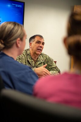 Rear Adm. Matthew Case, commander, Naval Medical Forces Atlantic, and director, Tidewater Market, discuss challenges with Sailors and civilians during an all hands call at the Norfolk Naval Shipyard Branch Health Clinic.