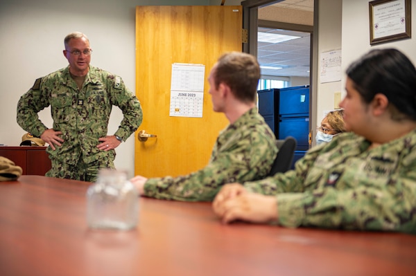 Naval Medical Forces Atlantic (NMFL) Command Master Chief Zachary Pryor discusses challenges with Sailors and civilians during an all hands call at the Norfolk Naval Shipyard Branch Health Clinic.