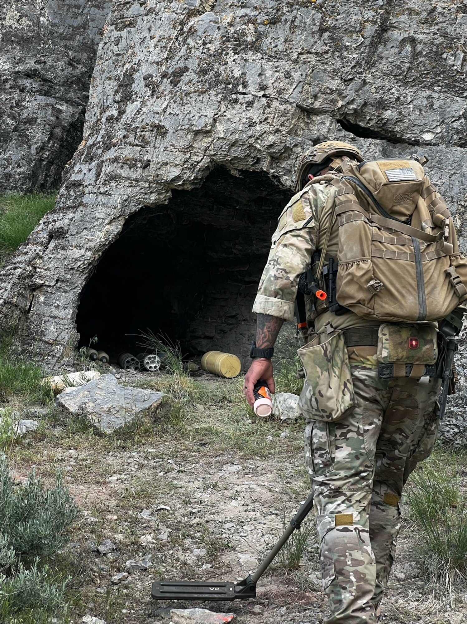 Staff Sgt. Austin Kener, EOD team leader from the 419th Civil Engineer Squadron, clears a route to a weapons cache during an exercise with the 775th Civil Engineer Squadron. (U.S. Air Force photo by Staff Sgt. Benjamin Casko)