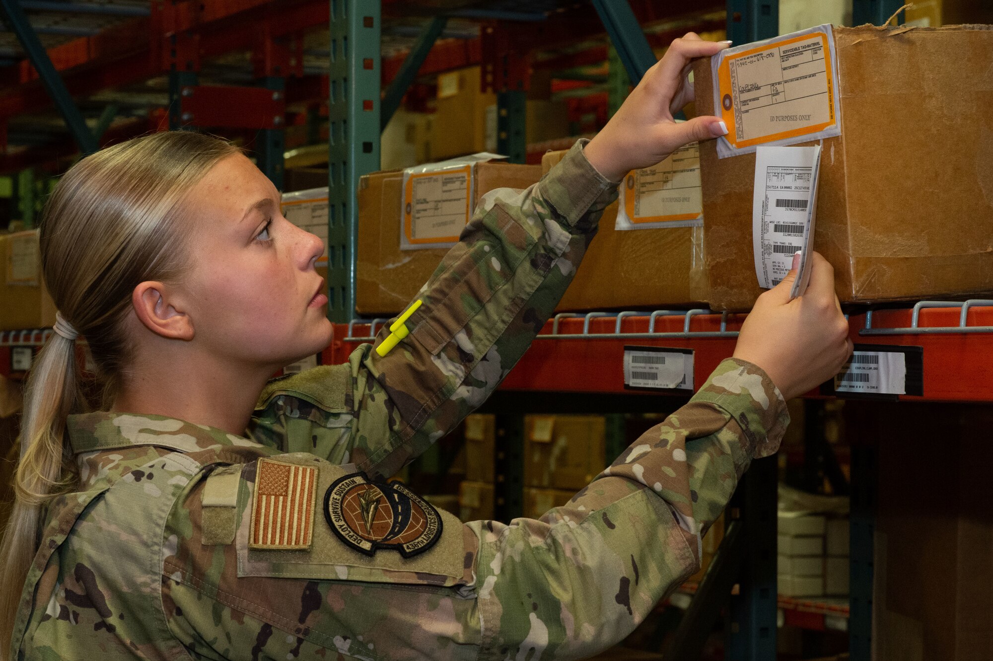 Airman Zoey Baylor, 436th Logistics Readiness Squadron central storage apprentice, verifies package documentation containing an aircraft part in the supply warehouse at Dover Air Force Base, Delaware, May 11, 2023. Central storage personnel retrieve items from the warehouse and prepare them for pick up or delivery. (U.S. Air Force photo by Roland Balik)